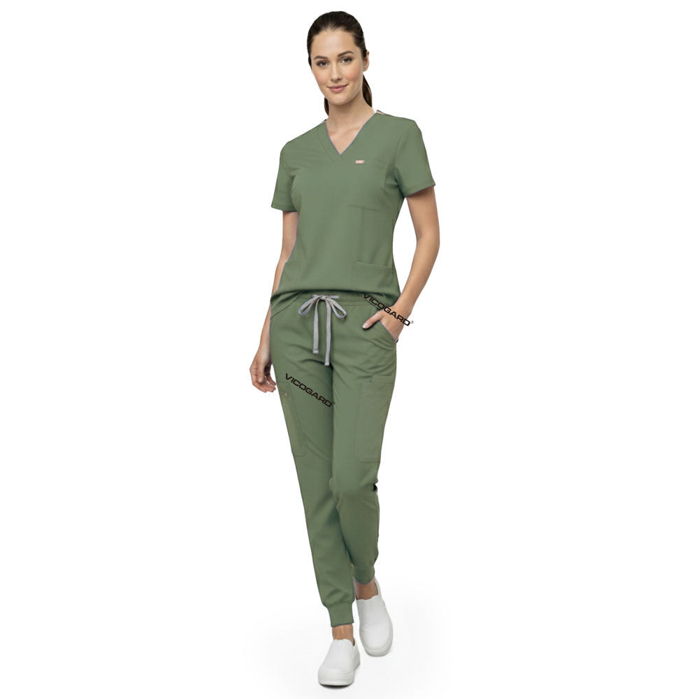 Close up of Fruit Green scrub pants waist showing elastic drawstring for comfortable custom fit
