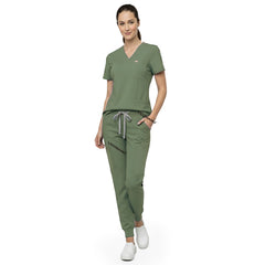 Close up of Fruit Green scrub pants waist showing elastic drawstring for comfortable custom fit