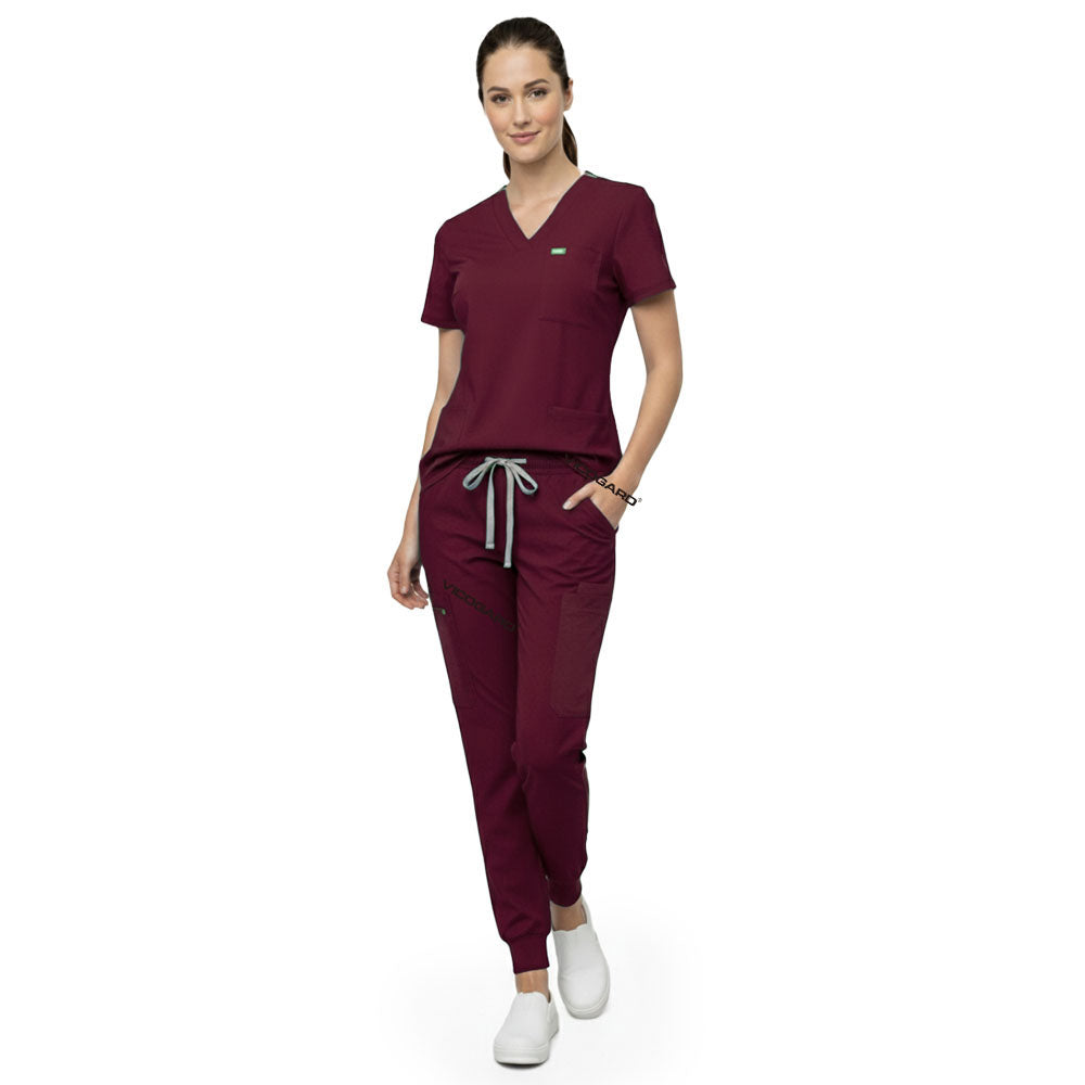 Close up of Burgundy scrub pants waist showing elastic drawstring for comfortable custom fit