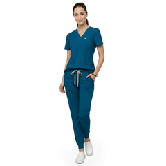 Close up of Caribbean Blue scrub pants waist showing elastic drawstring for comfortable custom fit