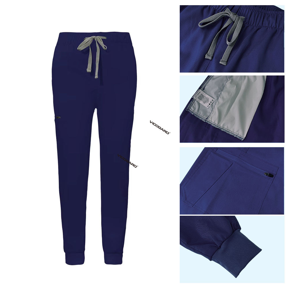 Detail of Navy Blue jogger scrub pants showing ribbed ankle cuffs and rayon fabric texture