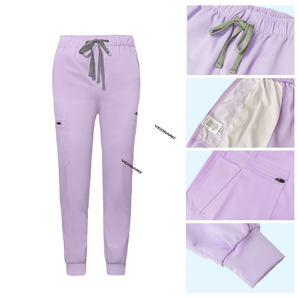 Detail of Lavender jogger scrub pants showing ribbed ankle cuffs and rayon fabric texture