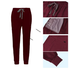 Detail of Burgundy jogger scrub pants showing ribbed ankle cuffs and rayon fabric texture