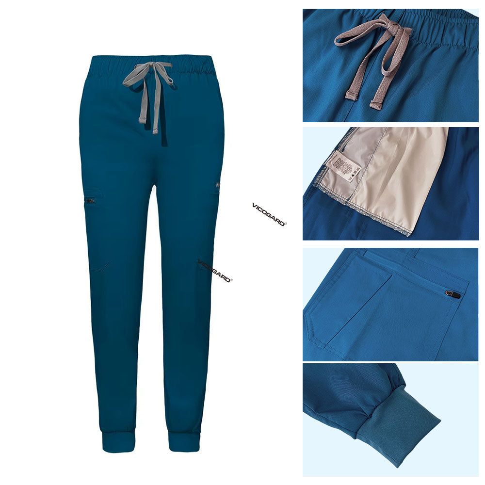 Detail of Caribbean Blue jogger scrub pants showing ribbed ankle cuffs and rayon fabric texture