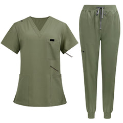 Flat lay of Fruit Green medical uniform featuring curved hem top and zipper pocket jogger pants