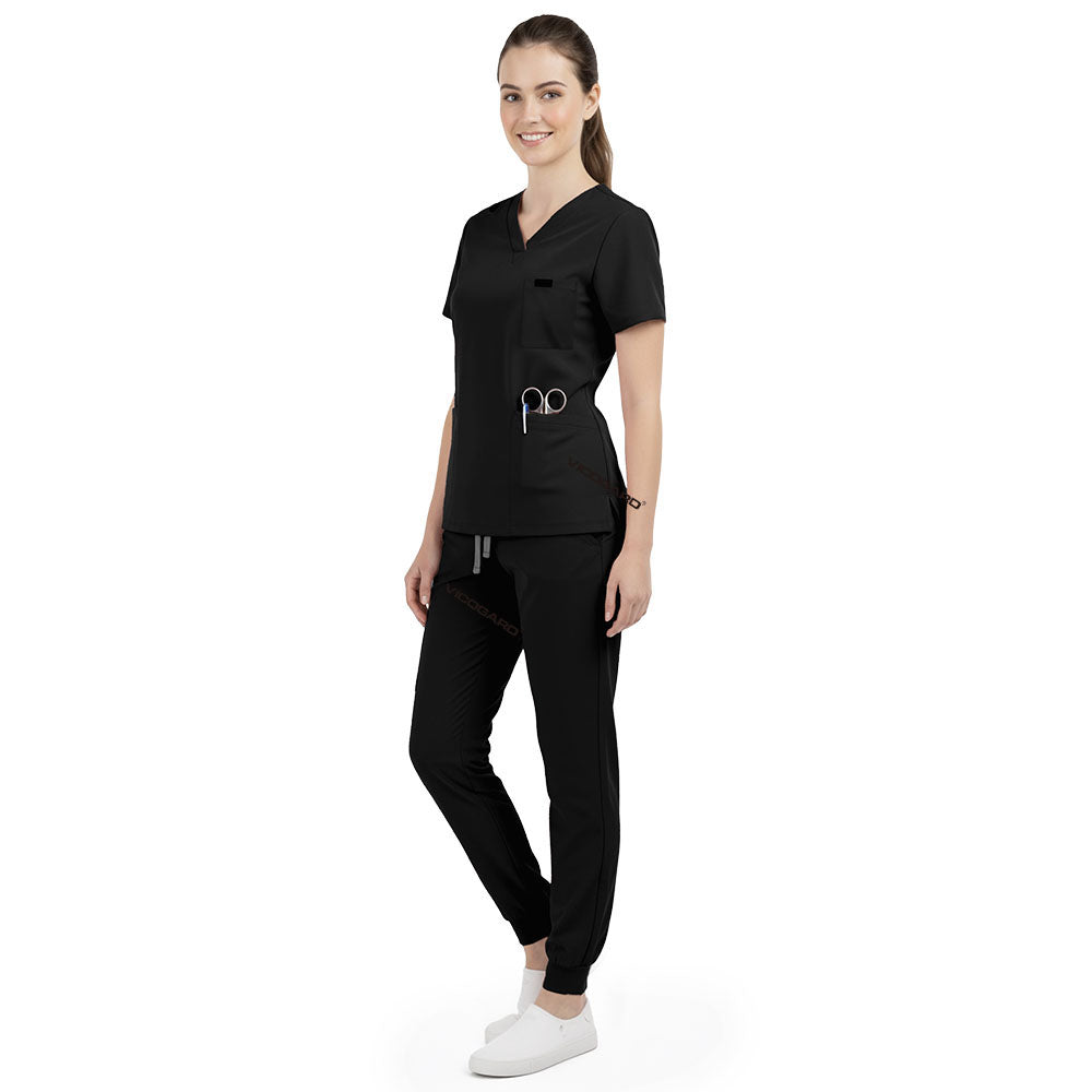 Side profile of Black nursing joggers showing slimming athletic fit and ribbed ankle cuffs