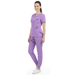 Side profile of Lavender nursing joggers showing athletic fit and ribbed ankle cuffs