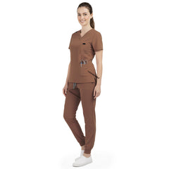 Side profile of Coffee nursing joggers showing athletic fit and ribbed ankle cuffs