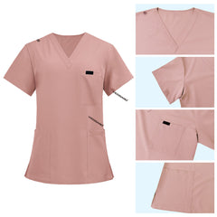 Detail of Pink scrub top shoulder D-ring loop for hanging ID badges and chest pocket flap