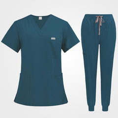 Caribbean blue medical uniform set flat lay top view