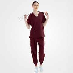 Tailored wine red V-neck scrub top and jogger pants front