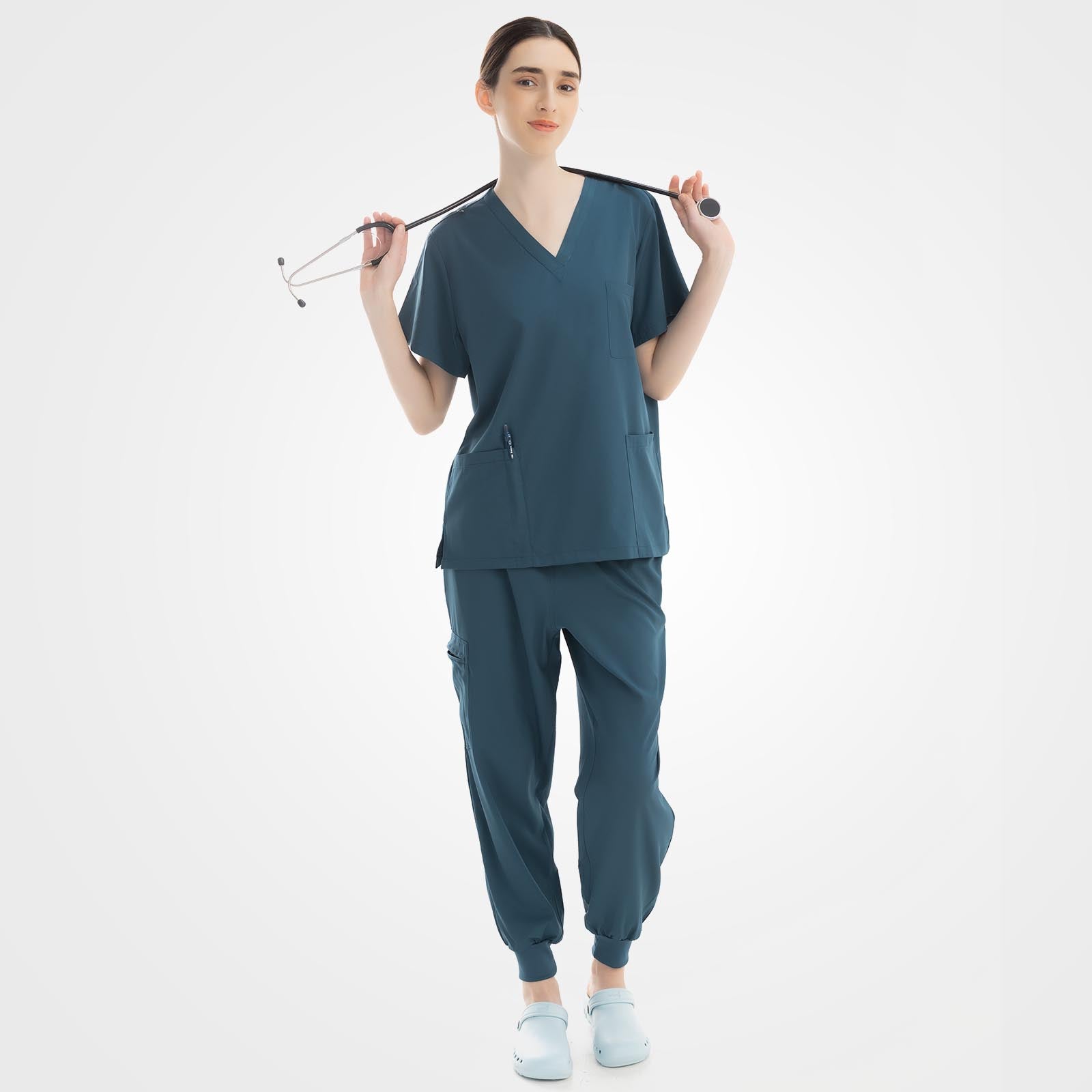 Vibrant caribbean blue V-neck scrub top and ribbed pants front view