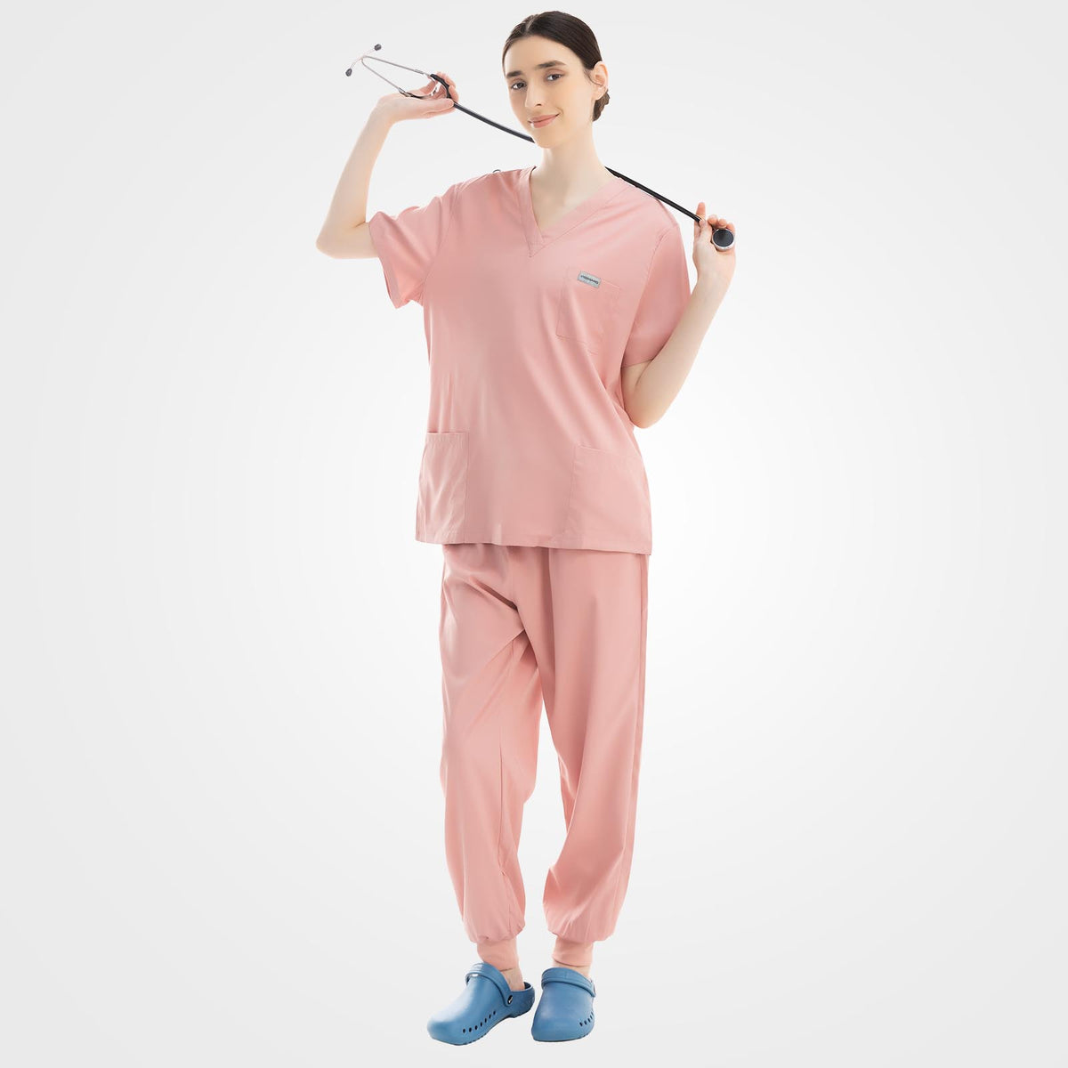 Vibrant pink V-neck scrub top and ribbed pants front