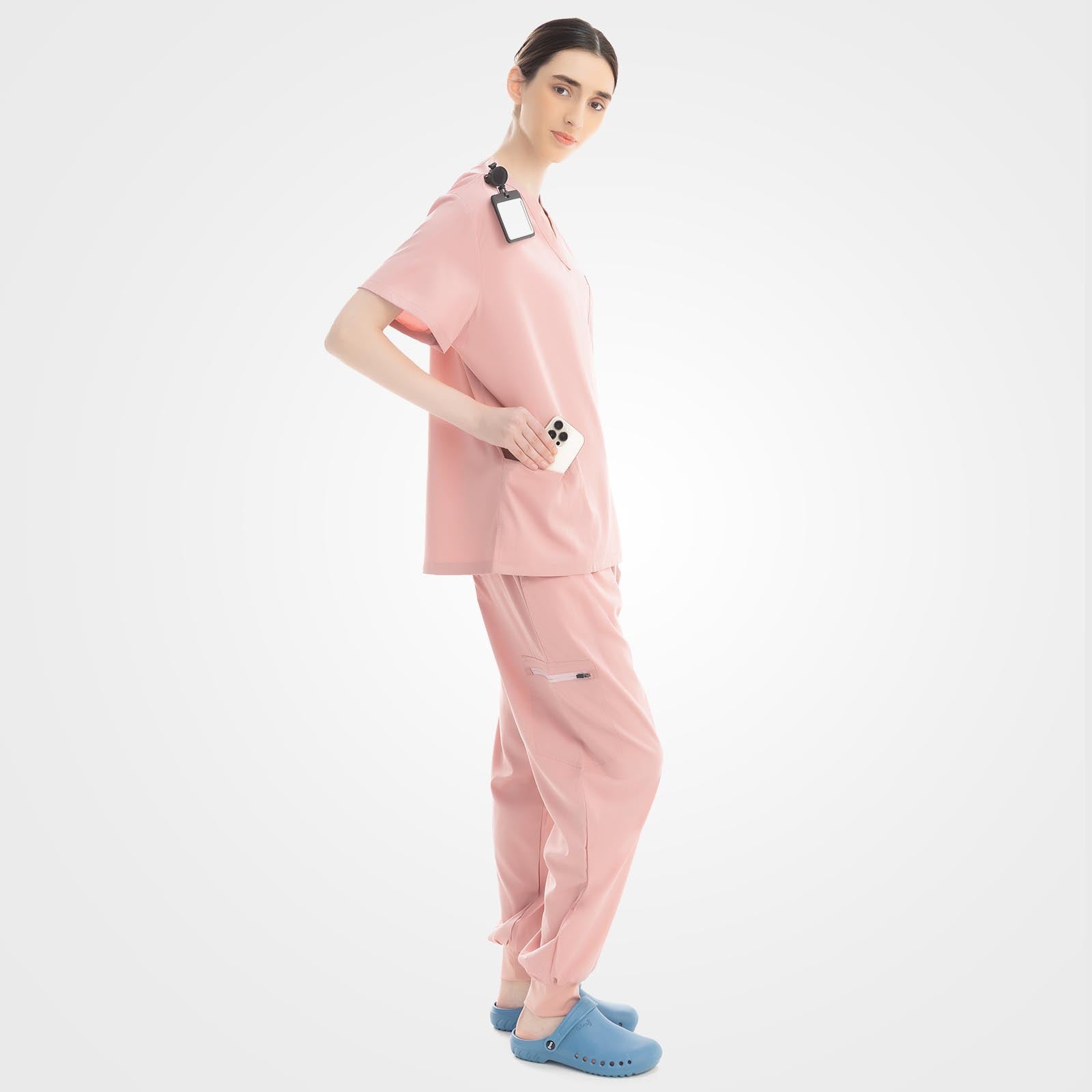 Pink athletic scrubs side profile with zippered pocket