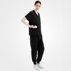 Black active scrub set side profile showing zippered thigh pocket