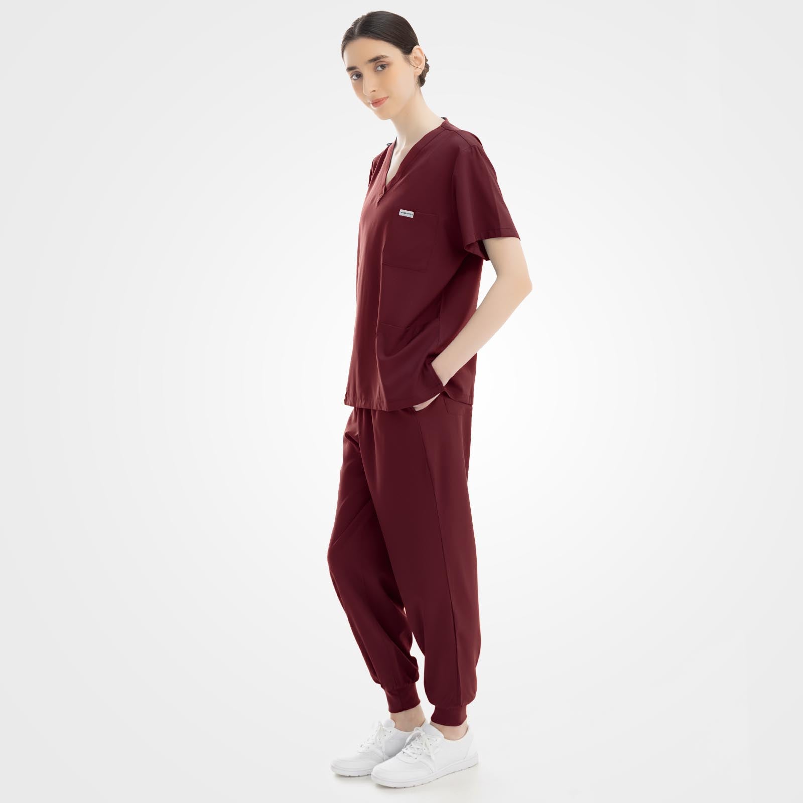 Women's wine red scrub set back view showing elegant drape