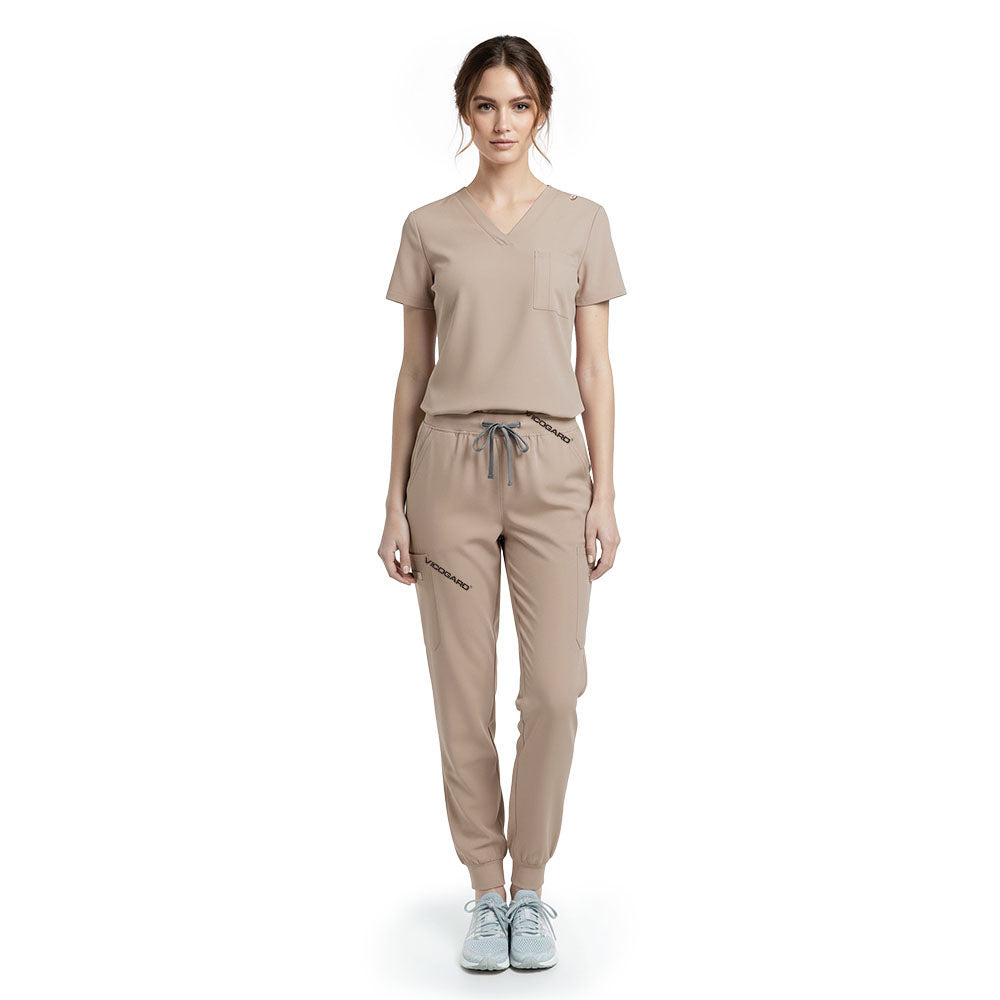 Vicogard Apricot performance jogger scrub set front view, warm V-neck top with badge loop