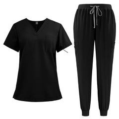 Flat lay of Black active medical uniform featuring streamlined top and 3-pocket pants