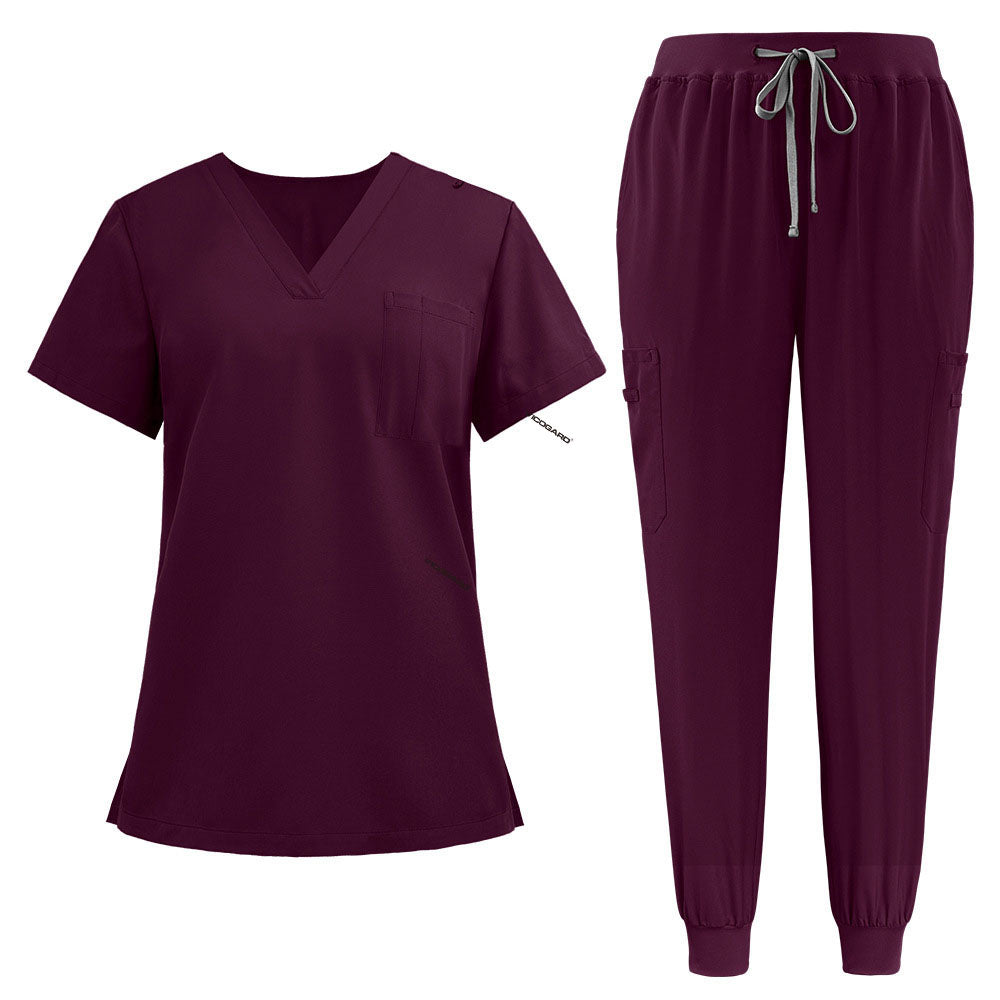 Flat lay of Burgundy active medical uniform featuring streamlined top and 3-pocket pants