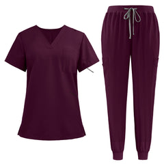 Flat lay of Burgundy active medical uniform featuring streamlined top and 3-pocket pants