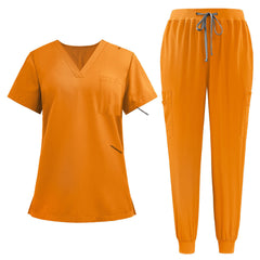 Flat lay of Mango Yellow active medical uniform featuring streamlined top and 3-pocket pants