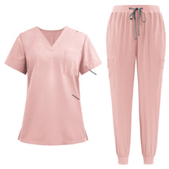 Flat lay of Pink active medical uniform featuring streamlined top and 3-pocket pants