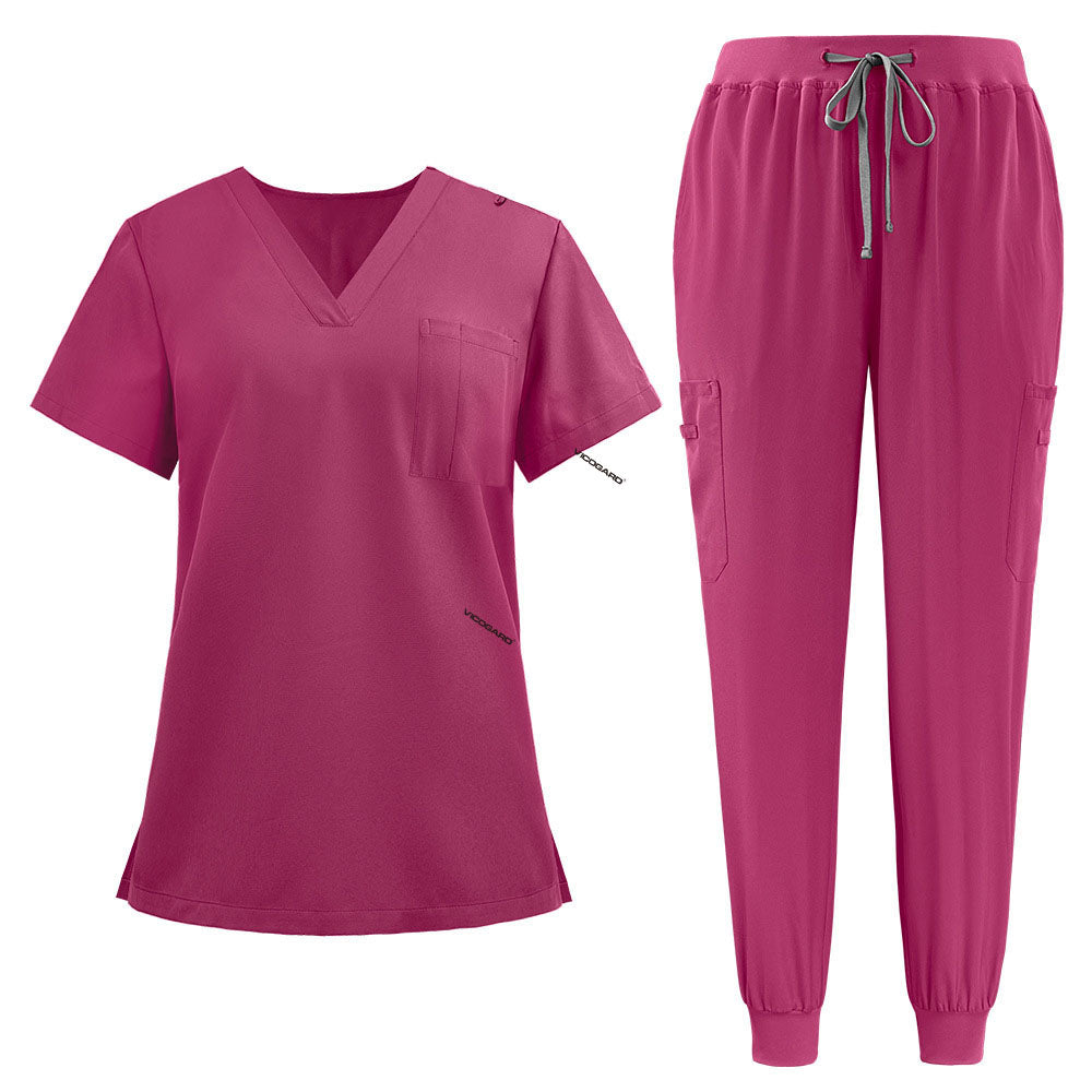 Flat lay of Rose Pink active medical uniform featuring streamlined top and 3-pocket pants