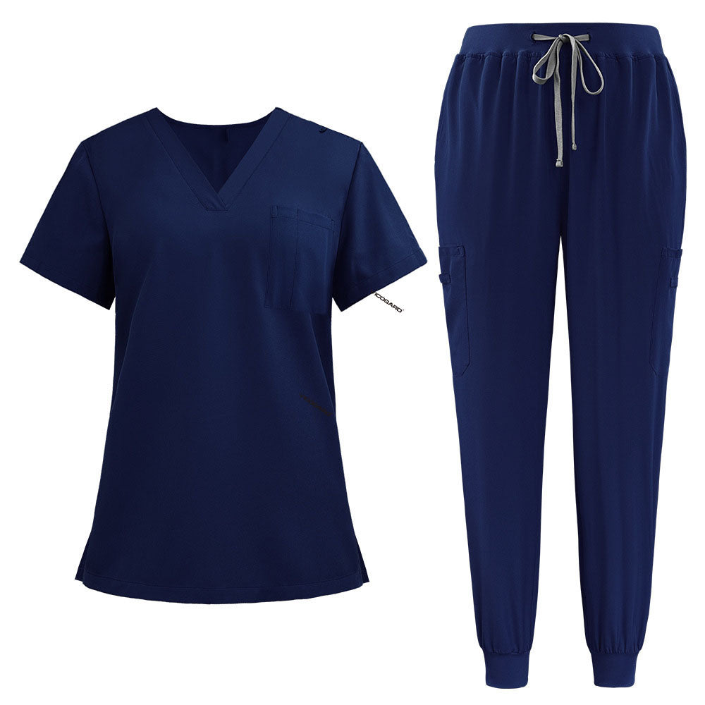 Flat lay of Galaxy Blue active medical uniform featuring streamlined top and 3-pocket pants