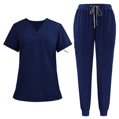 Flat lay of Galaxy Blue active medical uniform featuring streamlined top and 3-pocket pants