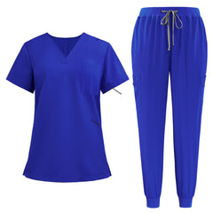 Flat lay of Royal Blue athletic medical uniform featuring badge ring top and cargo jogger pants