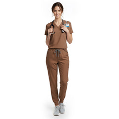 Veterinary technician wearing Coffee performance scrubs ready for active animal care