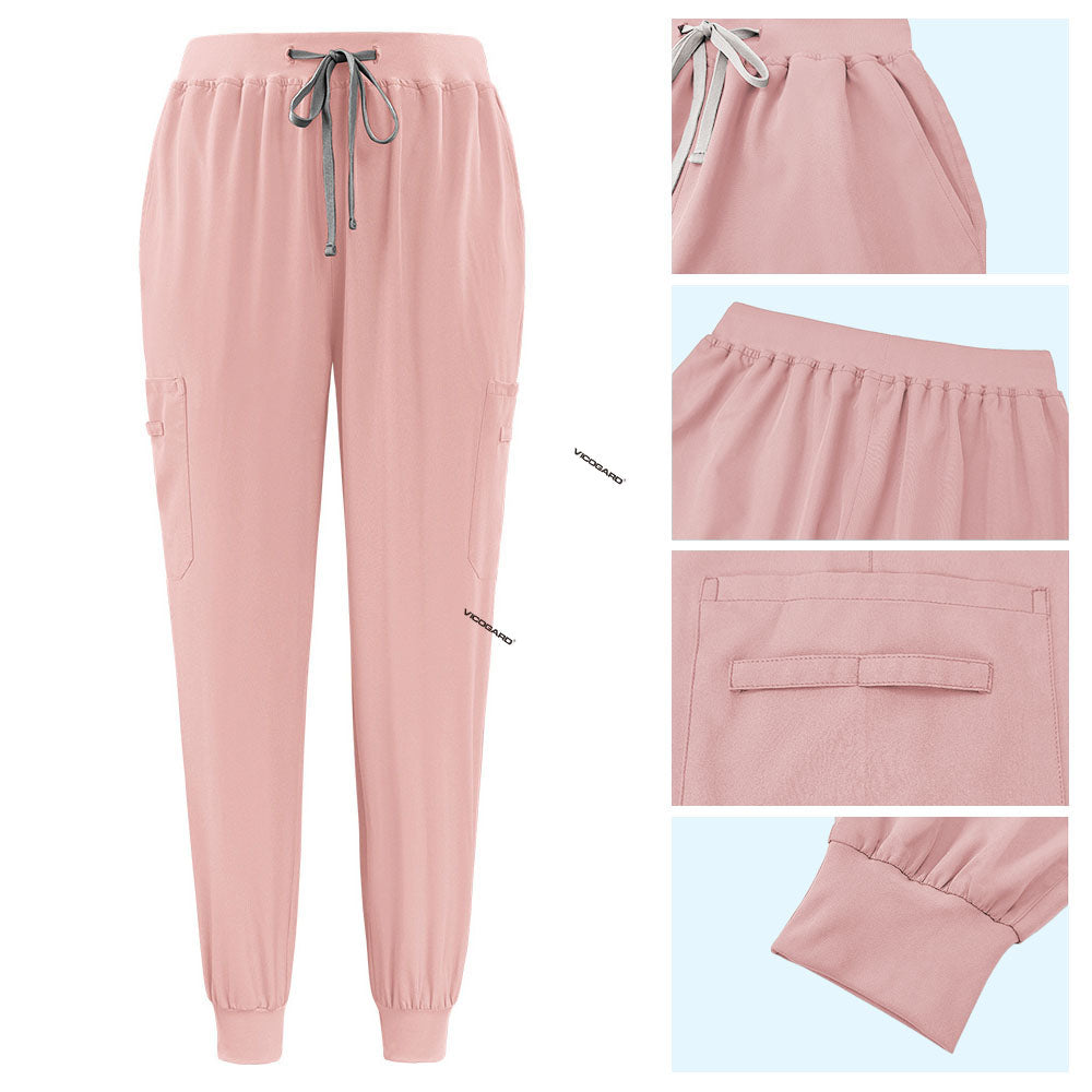 Detail of Pink active jogger pants with elastic waistband and durable side pocket