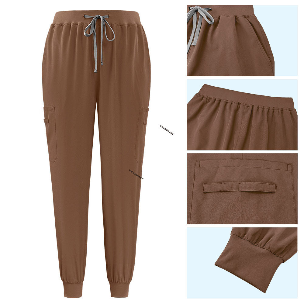 Detail of Coffee active jogger pants with elastic waistband and durable side pocket