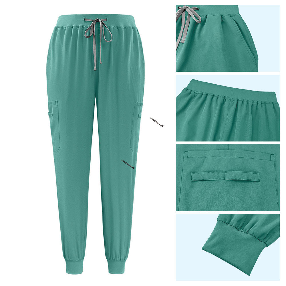 Detail of Turquoise active jogger pants with elastic waistband and durable side pocket