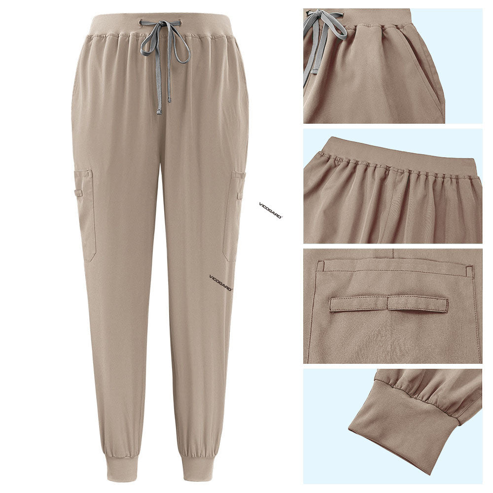 Detail of Apricot active jogger pants with elastic waistband and durable side pocket