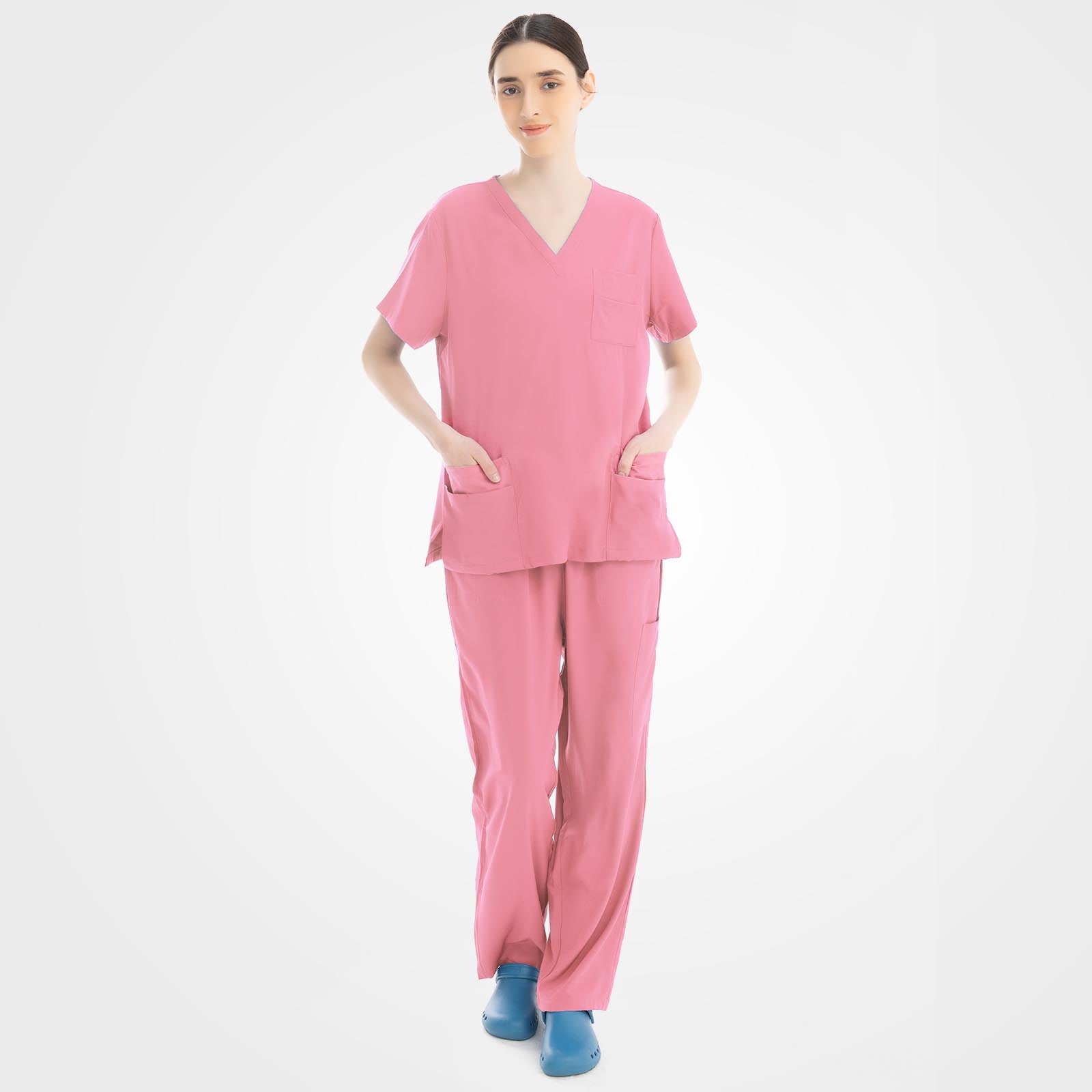 Women's pink scrub top and cargo pants front view