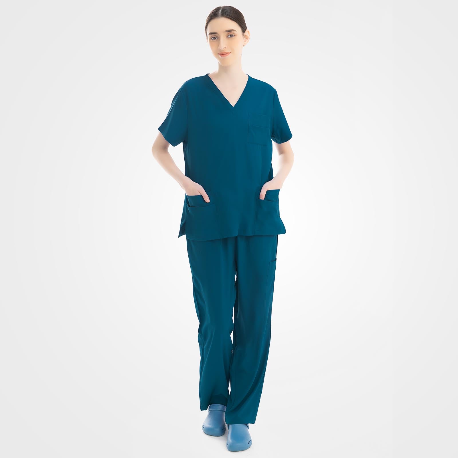 Women's caribbean blue scrub top and cargo pants front view