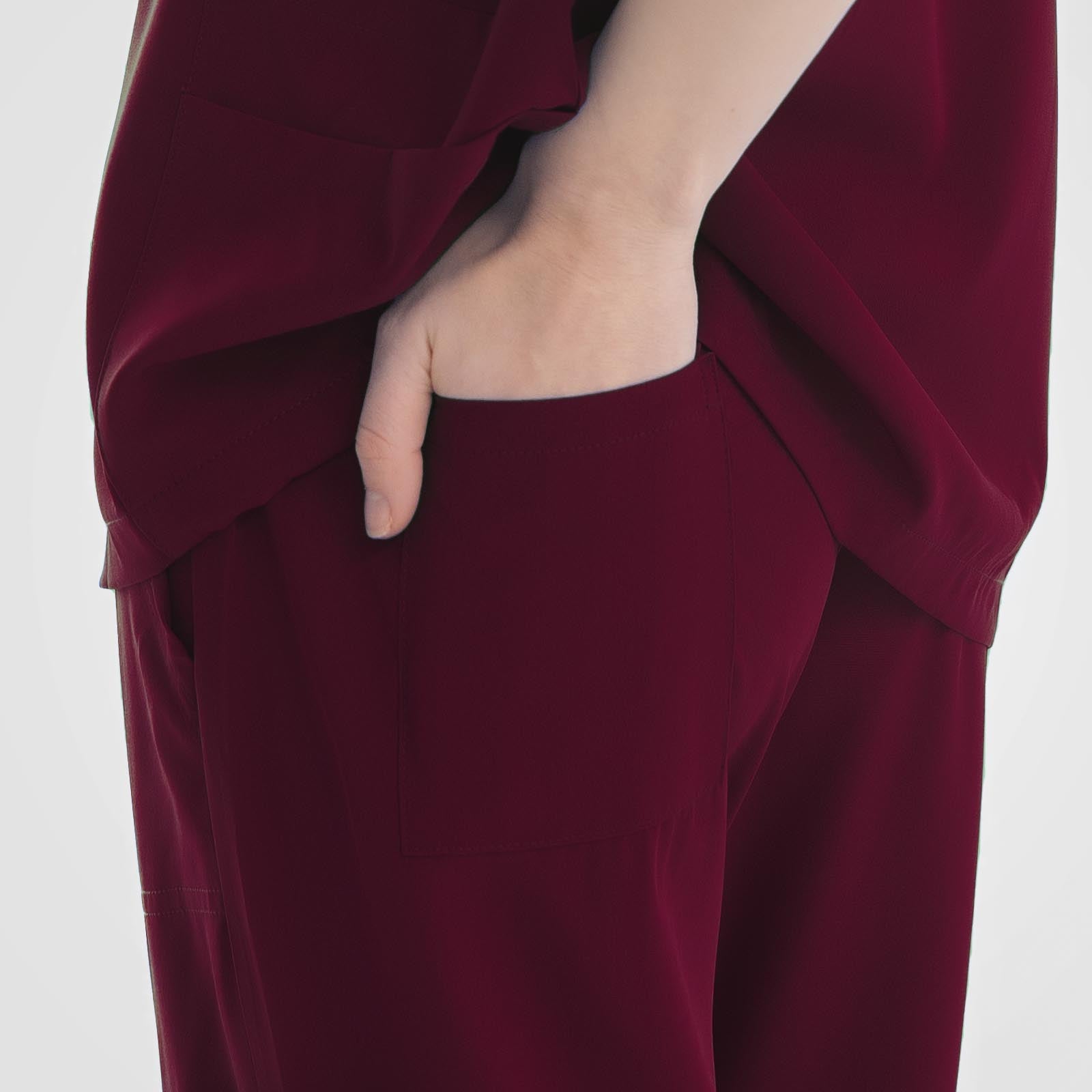 Burgundy scrub pants woman secure back pocket design