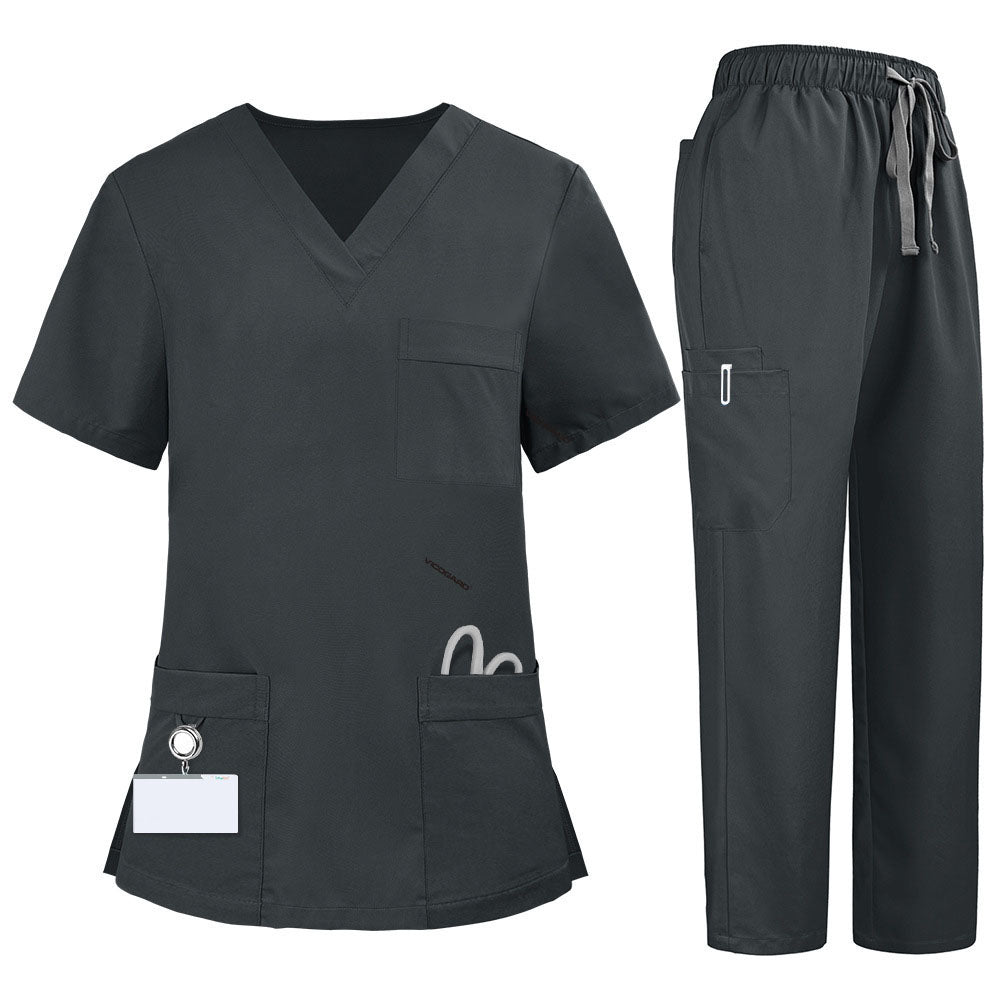 Flat lay of Gray medical uniform featuring V-neck top with bungee loop and 7-pocket cargo pants