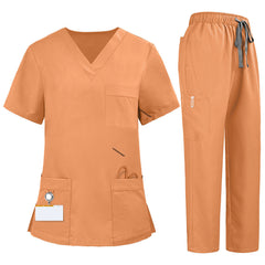 Flat lay of Orange medical uniform featuring V-neck top with bungee loop and 7-pocket cargo pants