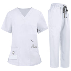 Flat lay of White medical uniform featuring V-neck top with bungee loop and 7-pocket cargo pants