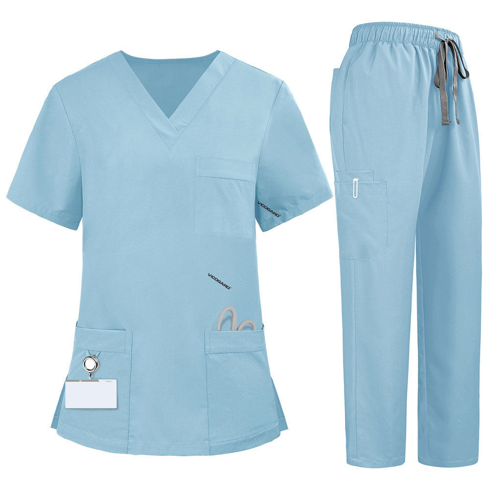 Flat lay of Marine Blue medical uniform featuring V-neck top with bungee loop and 7-pocket cargo pants