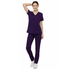 Front view of nurse walking in Grape straight leg scrubs, showing regal fit and 4-way stretch