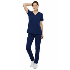 Front view of nurse walking in Galaxy Blue straight leg scrubs, showing modern fit and 4-way stretch