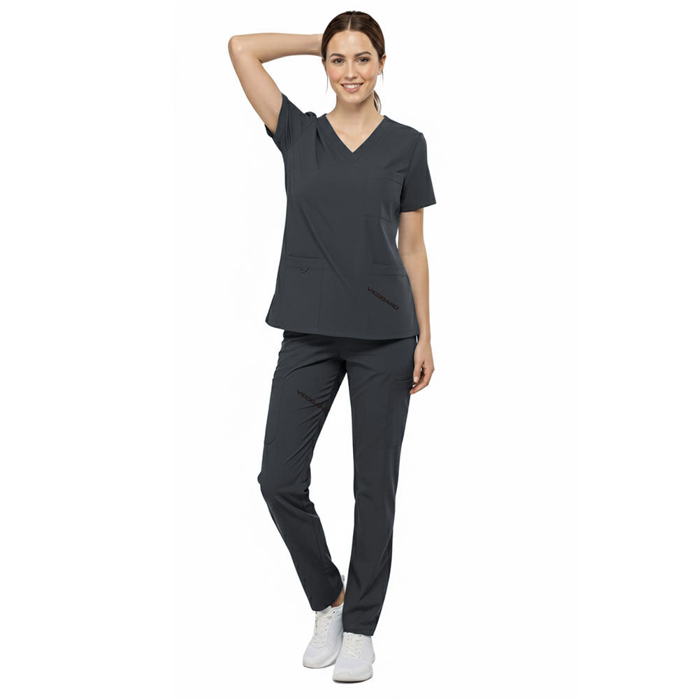 Front view of nurse walking in Gray straight leg scrubs, showing modern fit and 4-way stretch