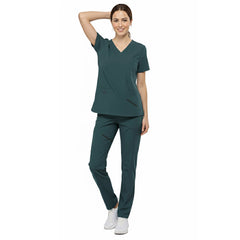 Front view of nurse walking in Turquoise straight leg scrubs, showing comfortable fit and 4-way stretch