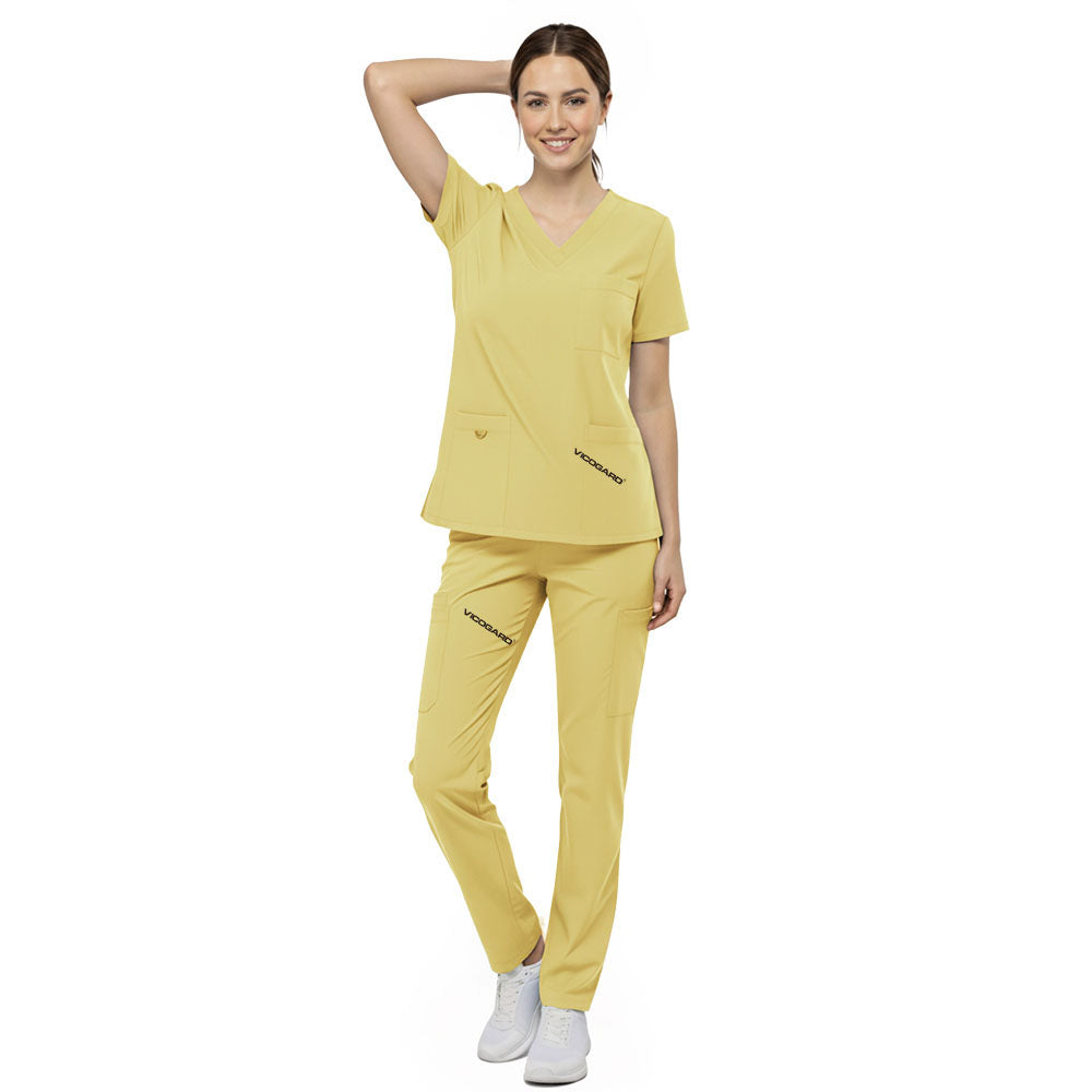 Flat lay of Cream Yellow medical uniform featuring V-neck top with bungee loop and 7-pocket cargo pants
