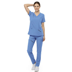 Front view of nurse walking in Royal Blue straight leg scrubs, showing professional fit and 4-way stretch