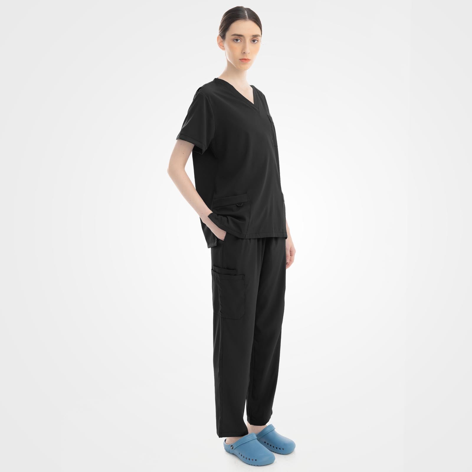 Black straight leg scrubs side profile showing ergonomic fit