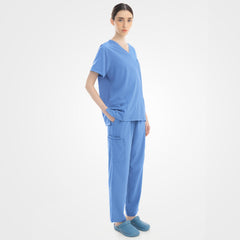 Side profile of ceil blue scrubs showing 4-way stretch and ergonomic fit